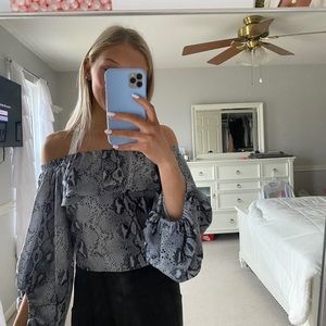 Snakeskin off the shoulder ruffle top